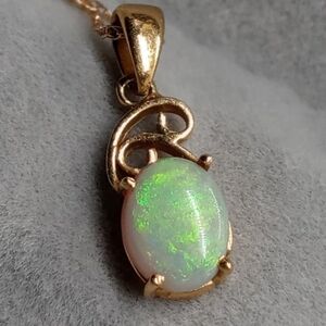 18k gold opal pendant only